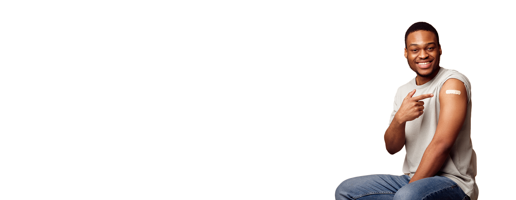 An image of a man pointing to the vaccination he just received on his left arm. The caption reads: 'Fight the flu. Vaccines now available on site. Ask at your appointment.'
